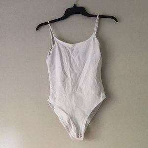 Backless white bodysuit